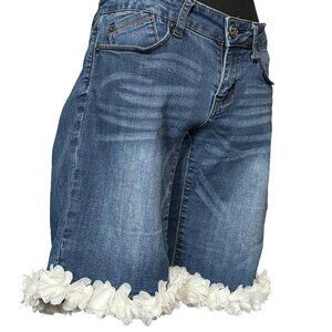 SHORTS WITH ROSETTE HEM
